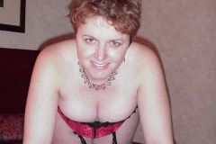 Cassi-red-corset-garters-thong-a-little-nipple-24